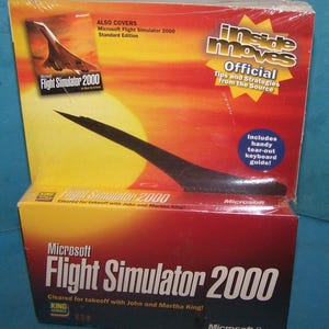 May include: A boxed copy of Microsoft Flight Simulator 2000, featuring a Concorde jet graphic on the front. The box has a red and yellow gradient background with the text "Inside Moves" and "Official Tips and Strategies from the Source."