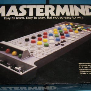 May include: A set of three ceramic mugs with a speckled, matte finish. The mugs are in shades of cream, light brown, and dark brown. Each mug has a rounded handle and a simple, minimalist design.