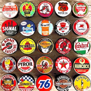 May include: A collection of vintage motor oil and gasoline can lids. The lids feature various brand logos, including "Esso," "Gulf," "Texaco," and "Pennzoil." The lids are round and have a distressed, aged appearance, with vibrant colors and text.