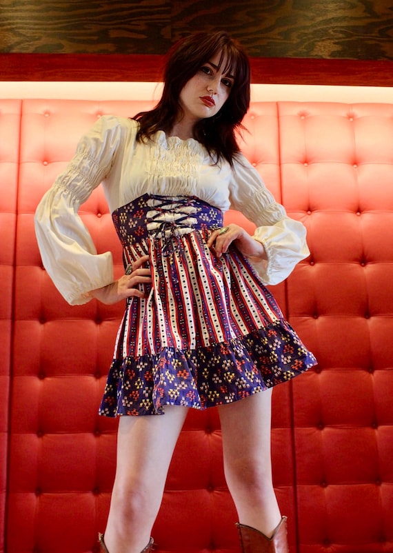 1970s mini dress Corset Dress: XS/Small Ruffled Floral Cotton Pair it with our favorite gogo boots for an even more vintage look. 1970s Hand-Crocheted Purple Mini Dress-small