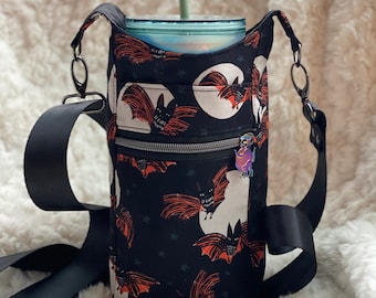 Drink Sling, H2O2go, water carrier, orange and black, bats and moon, with zipper pocket