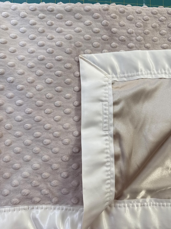 Beige minky dot baby blanket with light tan satin backing and ivory binding  30 x 35.  FREE embroidery
