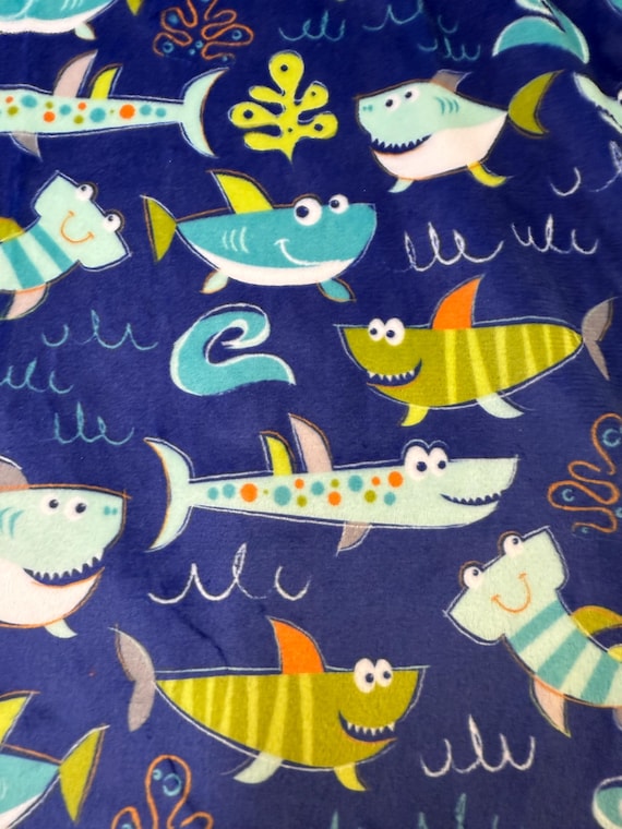 30 x 35 Royal Blue funny sharks with royal blue satin backing and royal blue or teal binding with FREE embroidery.