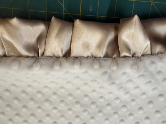 30 x 35 ivory minky dot blanket with champagne satin backing and ruffles with FREE embroidery.