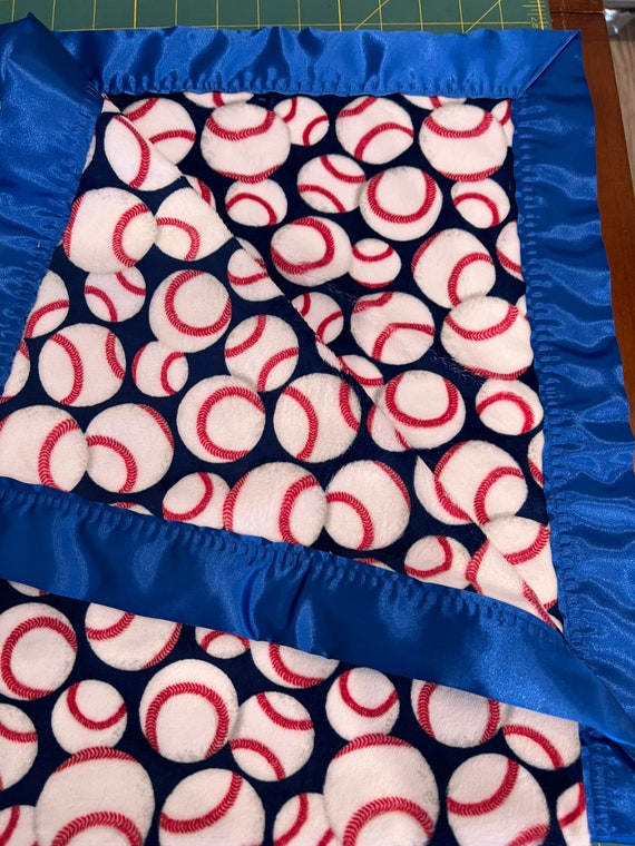 30 x 35 Red~white~blue baseball double minky baby blanket with royal blue satin backing and binding.