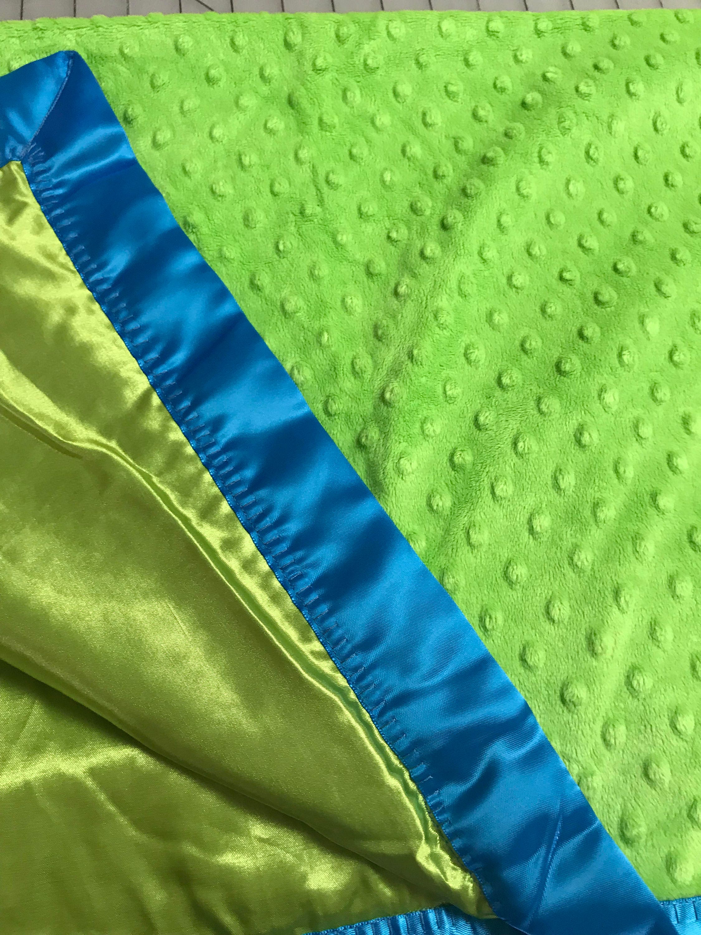 Lime minky dot and satin blanket with neon blue binding