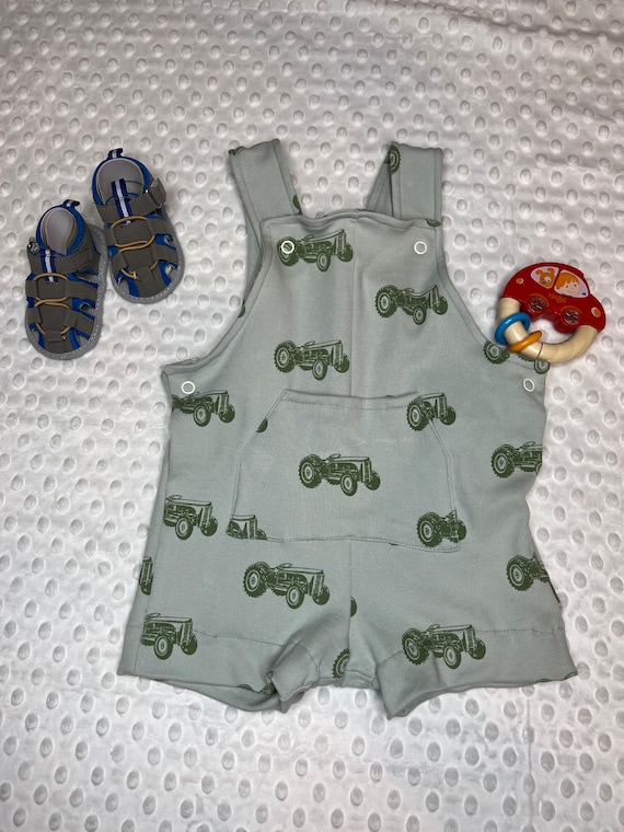 Tractor knit cotton romper overalls with pockets in pale blue and green