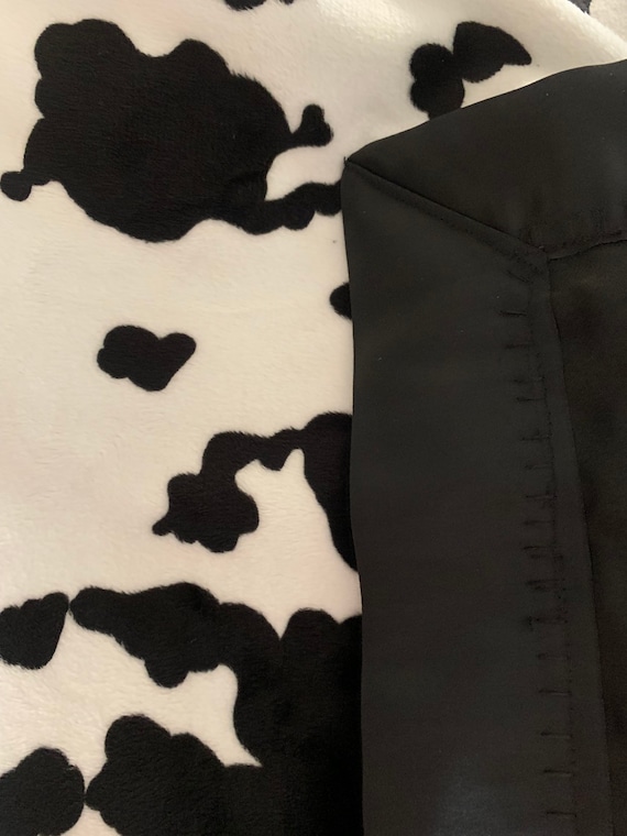 Cow print minky and satin baby blanket 30 x 35 wit black satin backing and binding and FREE embroidery