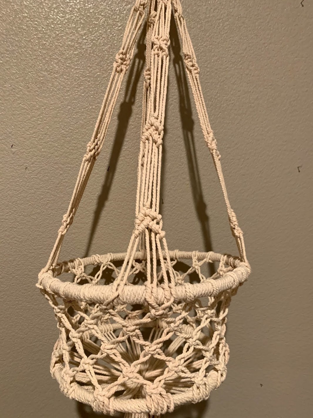 macrame hanging toy basket
