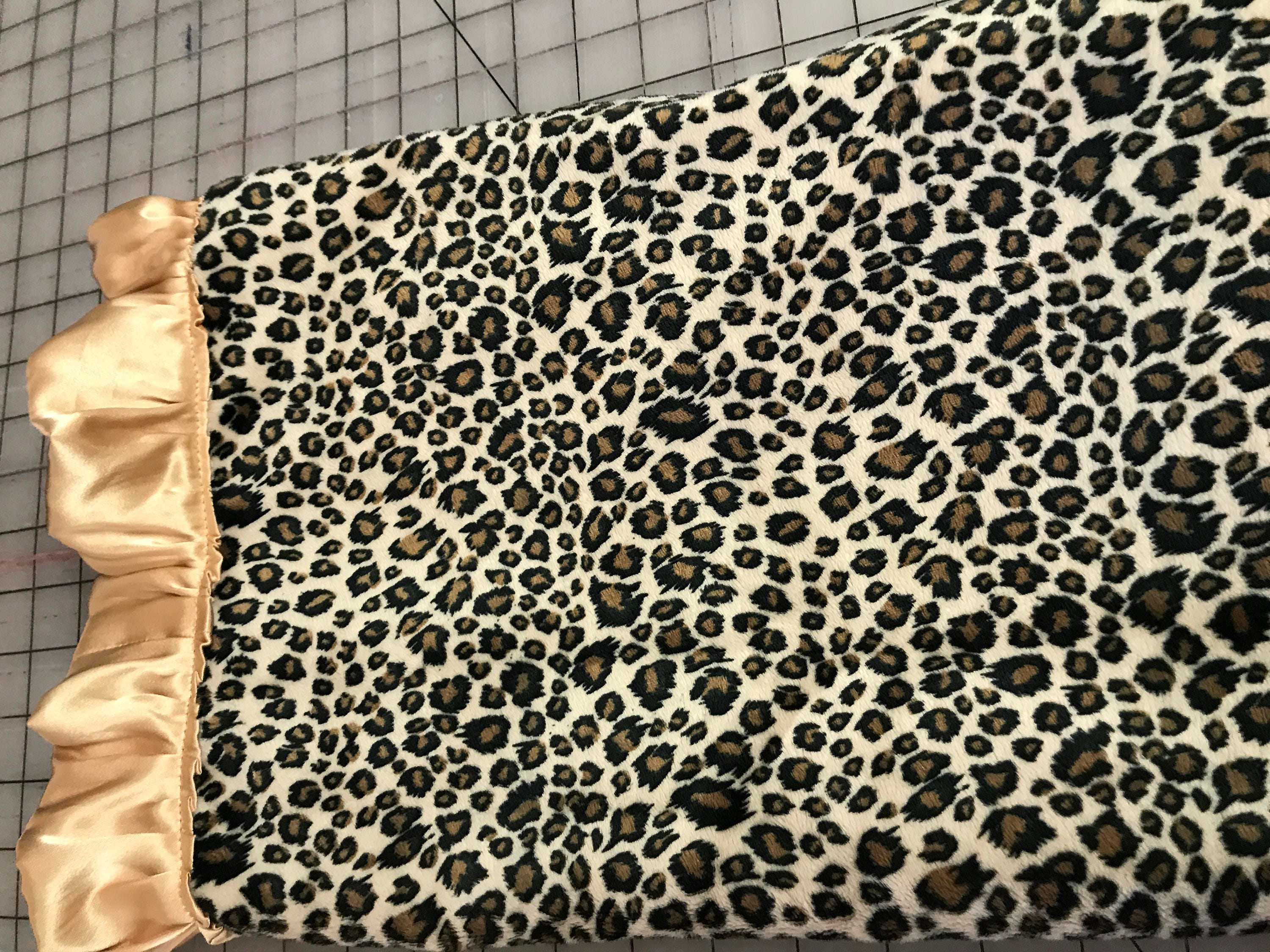 Gold and black leopard print minky and satin blanket with ruffles
