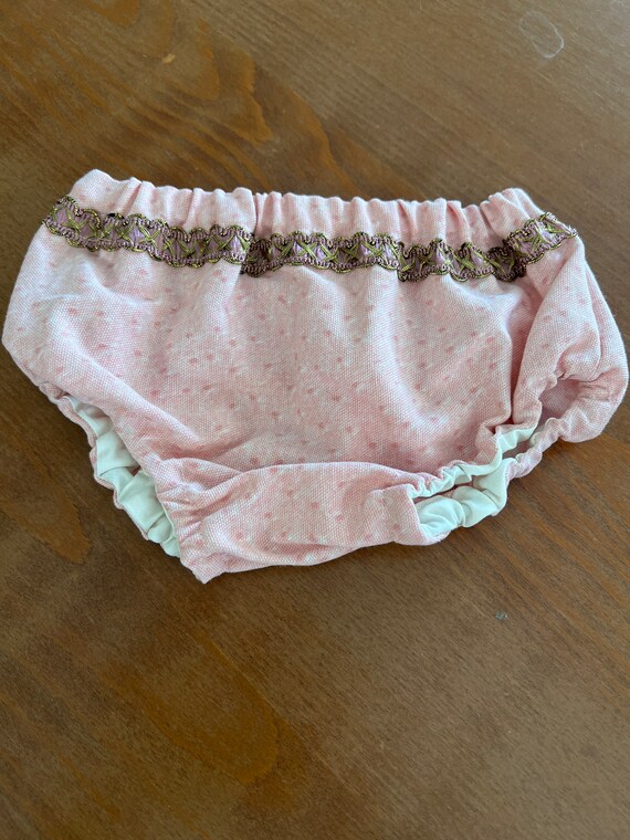 Pink bloomers with pink and gold trim