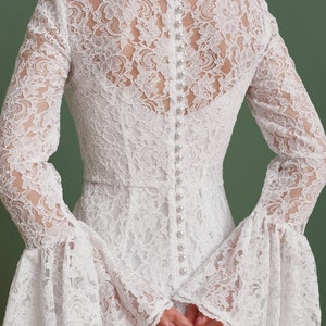 pearl buttons on the modest wedding dress back