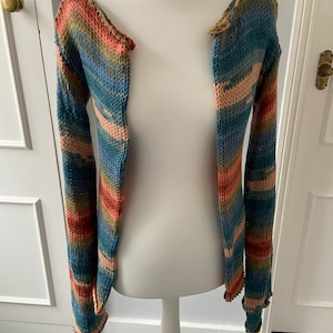 Cardigan in warm muted colours