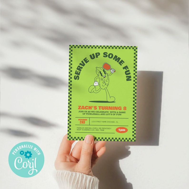 May include: Green and yellow birthday party invitation with a cartoon pickle holding a paddle. The text reads "Serve Up Some Fun Zach's Turning 8" with the date, time, and location of the party.