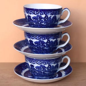 Set of three Willow pattern teacups Crescent George Jones and Sons blue transferware