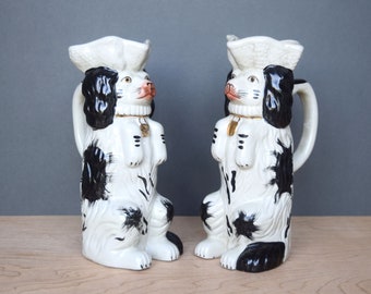 Vintage pair of Staffordshire dog reproduction jugs Ceramic mantlepiece spaniel pitchers