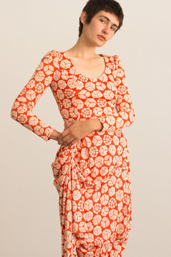 1970s Orange and Cream Printed Jersey Maxi Dress