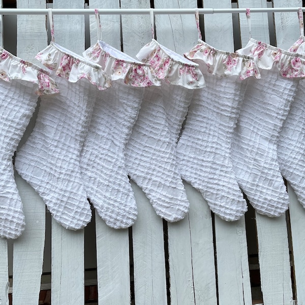 Handmade Christmas stocking; primary fabric from a re-purposed cotton chenille bedspread, ruffle made with floral Shabby Chic sheet.