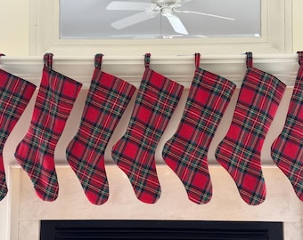 Traditional Tartan plaid Christmas stocking made with vintage woven fabric. Red with stripes of green, black, yellow, blue, white. 19" long.