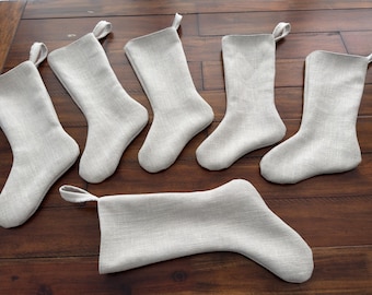 Country farmhouse Christmas stocking in rich woven upholstery/drapery fabric. Neutral color blends creamy ivory, oatmeal, and hints of gray.