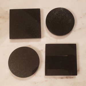 Granite coasters set of 4 handmade Absolute Black Granite coasters, black with reflective accents round 4&quot; diameter. round square or mix