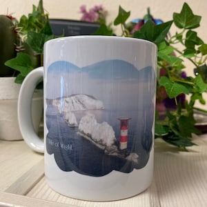 The Needles at Isle of Wight (cloud shape design ) mug can be personalised with a name