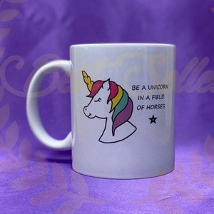 Unicorn, in a field of horses mug can be personalised with a name