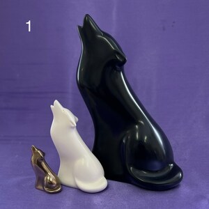 Free small wolf statue when you purchase this Wolf statue SET OF 3 contains crystals