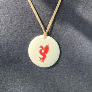 Phoenix palm stone Sacred Energy Handheld or as a Necklace made with divine energy and crystals