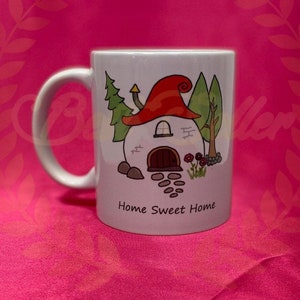 Home sweet home, whimsical house mug can be personalised with a name
