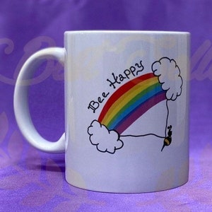 Bee happy rainbow mug can be personalised with a name