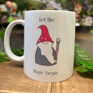 Wizard let the magic begin mug can be personalised with a name