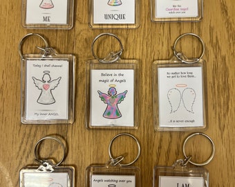 ANGEL related  keyring comes in a FREE pouch - various designs