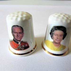 Two Fine Bone China Thimbles With Printed On Pictures Of The Queen And Duke Of Edingburgh.