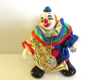 Small Vintage Porcelain Clown Orange Painted Hair And Clown Outfit Collectable Design - With Instrument.