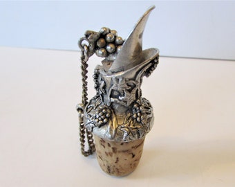 Vintage Pewter With Grapes Design With A topper stop Also On Top And A Cork Stopper - 2-3/4" High.