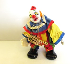 Small Vintage Porcelain Clown Orange Painted Hair And Clown Outfit Collectable Design - With Instrument.