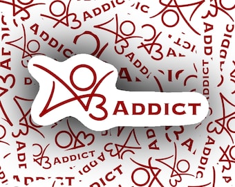 May include: A white sticker featuring a dark red graphic logo and the text ADDICT in a bold serif font. The sticker is placed against a repeating background pattern of the same dark red logo and the word ADDICT printed on a white surface.