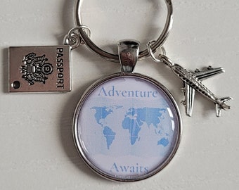 Travel keyring, Adventure Awaits, Passport and aeroplane charms.