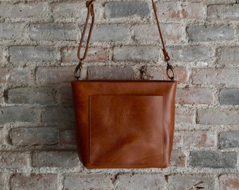 Small COGNAC / TAN Crossbody leather bag with outside pocket and Zipper. Handmade.