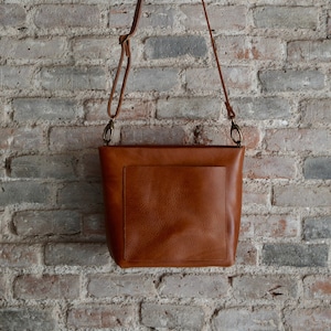 Small COGNAC / TAN Crossbody leather bag with outside pocket and Zipper. Handmade. image 1