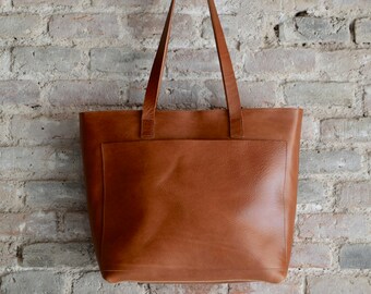 leather tote with outside pockets