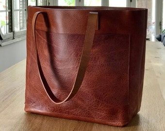 Oversized Cognac Leather tote bag with outside pockets. Cap Sa Sal Bag. Handmade.