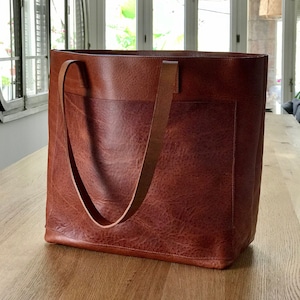 Oversized Cognac Leather tote bag with outside pockets. Cap Sa Sal Bag. Handmade.