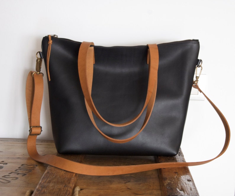 Black Leather bag with zip and brown leather straps. image 3