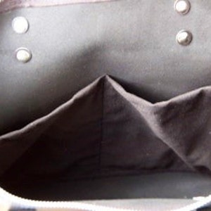 Black Leather bag with zip and brown leather straps. image 6