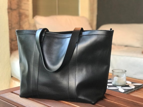 Oversized Black Leather bag with zip and inside lining with 4