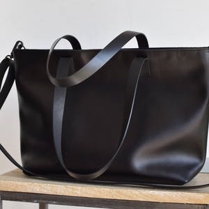 Black Leather bag with zip and inside lining. Handmade. Zipper. Minimalist leather bag.