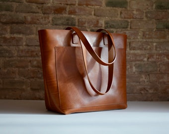 Oversized Cognac Leather tote bag with outside pockets. Cap Sa Sal Bag. Handmade.