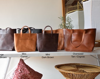 Veg tanned leather bag available in 4 colors. Leather tote with large outside pocket. Cap Sa Sal Collection. 3 sizes. Handmade.